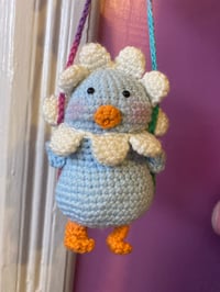 Image 1 of Swinging duck (blue) 