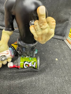 Image of Graf Can Man sculpture by DL