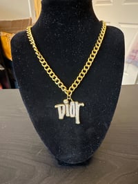 Gold dior necklace