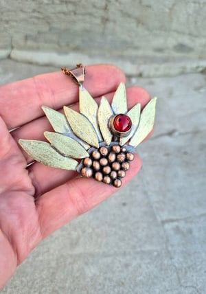 Sunflower pendant with ladybug 
