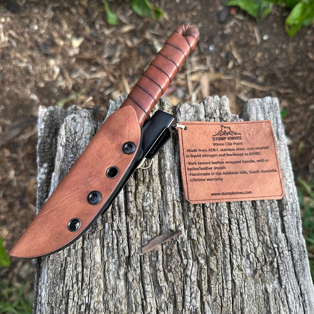 Image of 90mm clip point 14c28 leather