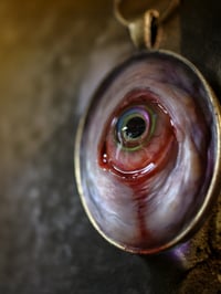 Image 10 of Color Shift Eye glow in the dark pendant OOAK