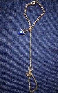 Image 1 of Gold plated slave bracelet with charms