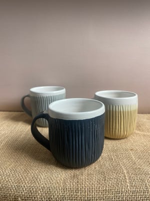 Image of carved mug black