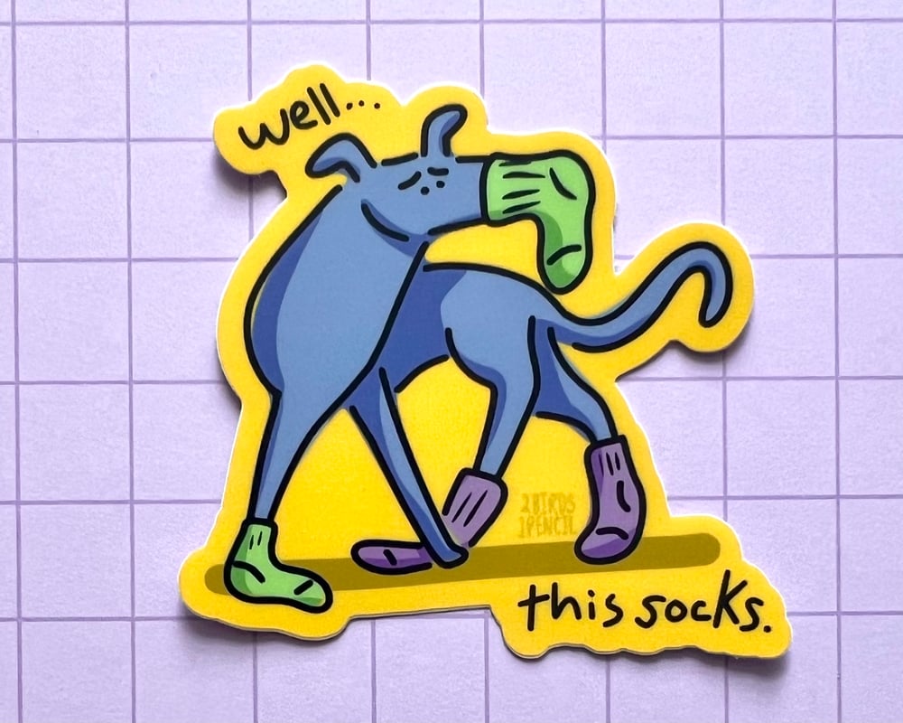 Image of Dog in socks vinyl sticker