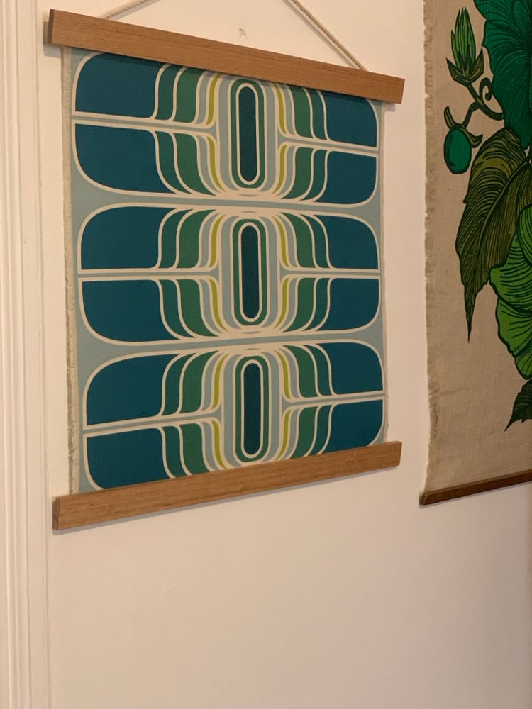 Image of ‘Teleport’ in teal small Vintage Groove wall hanging