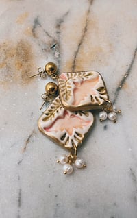 Image 1 of Peachy bird & pearl cluster earrings 