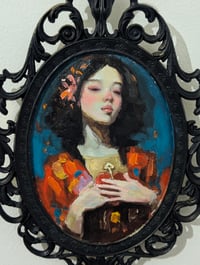 Image 2 of The Heart she holds