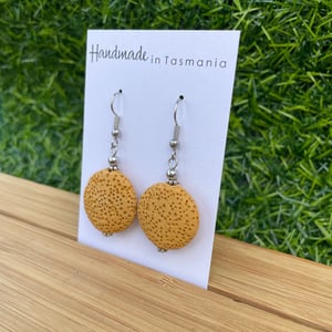 Image of Mustard Disc Lava Beaded Earrings 
