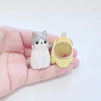 Image 4 of Gray and white Banana cat ceramic figurine 