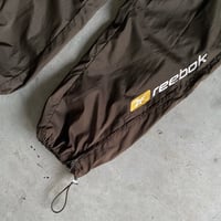 Image 2 of REEBOK SPELLOUT CUFFED TRACKSUIT PANTS