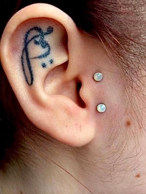 SURFACE TRAGUS PIERCING SERVICES