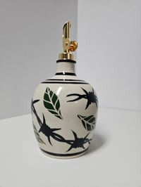 Image 4 of Oil Bottle 5 - Flowers & bared wire