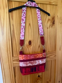 Image 3 of Red Cross body with adjustable stry