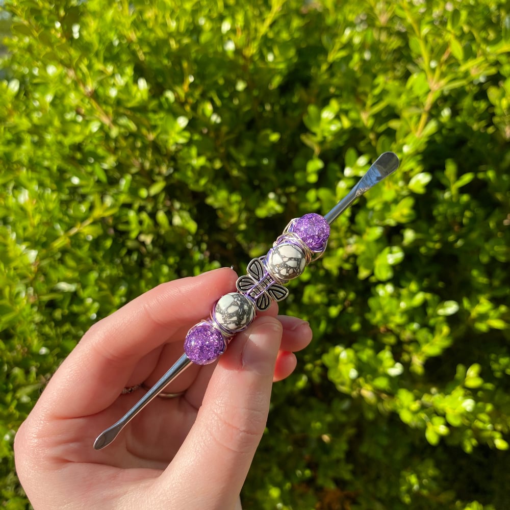 Image of violet butterfly dab tool 