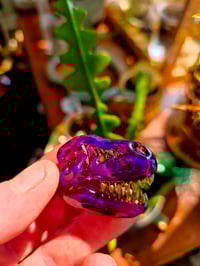 Image 2 of Royal jelly mini T-Rex skull pendant with uv reactive teeth 💜 