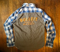 Upcycled “Bulleit Whiskey” t-shirt flannel