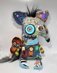 Image 1 of "Benson" the wolf and "George" the chicken leg 