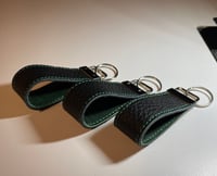 Image 1 of Black and green key chain 