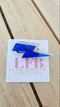 Broche FLASH saphir