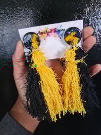 Image 1 of BLK/YELLOW Tassel 