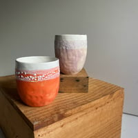 Larger pinched coloured cups
