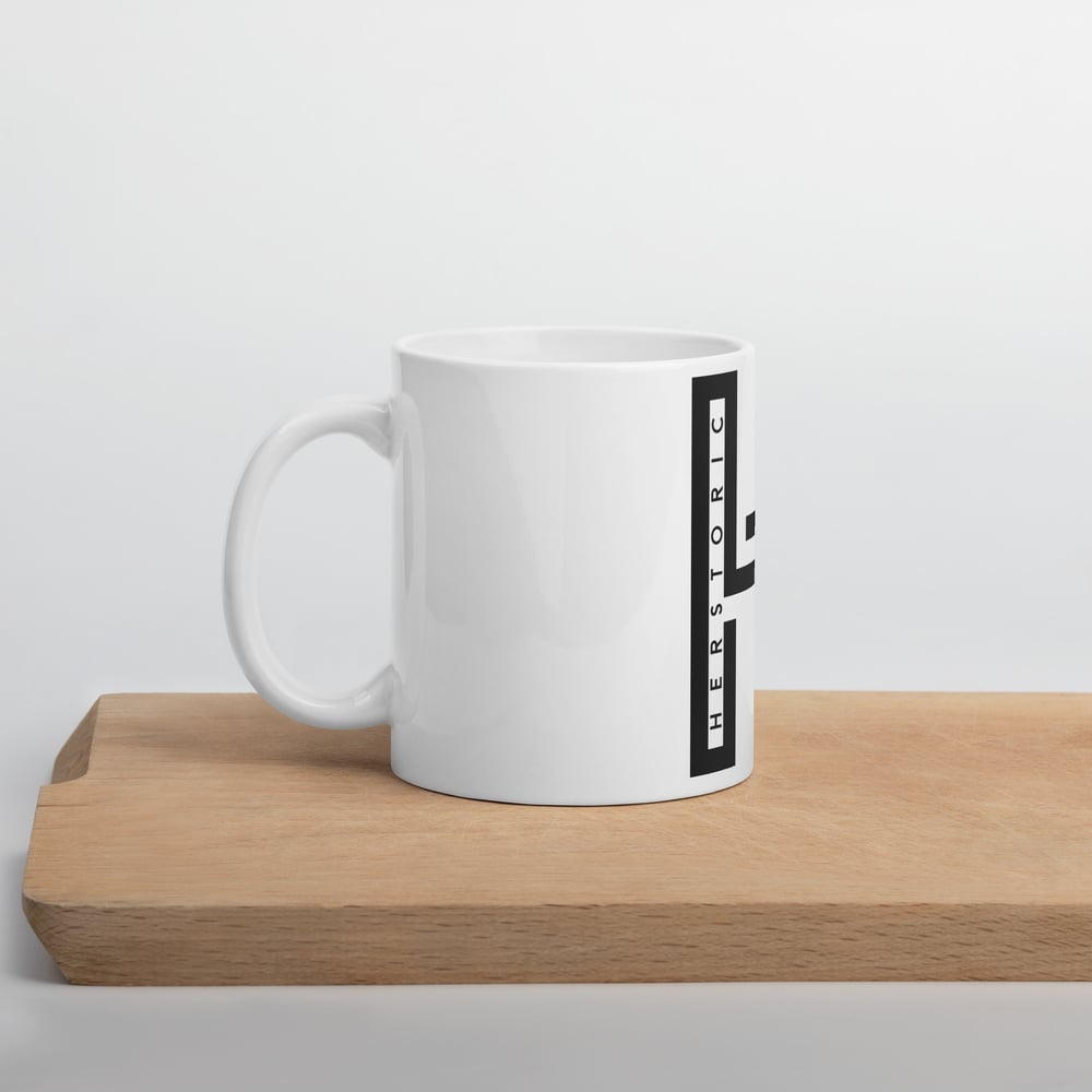 White glossy h mug