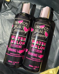 Image 2 of Extreme Tanning Lotion (Cherry or Watermelon)