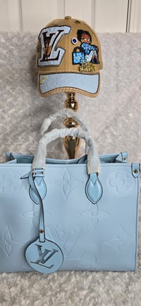 Image 1 of Light Blue medium OTG w hat