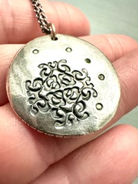 Image 3 of green sapphire pendant with handwritten quote