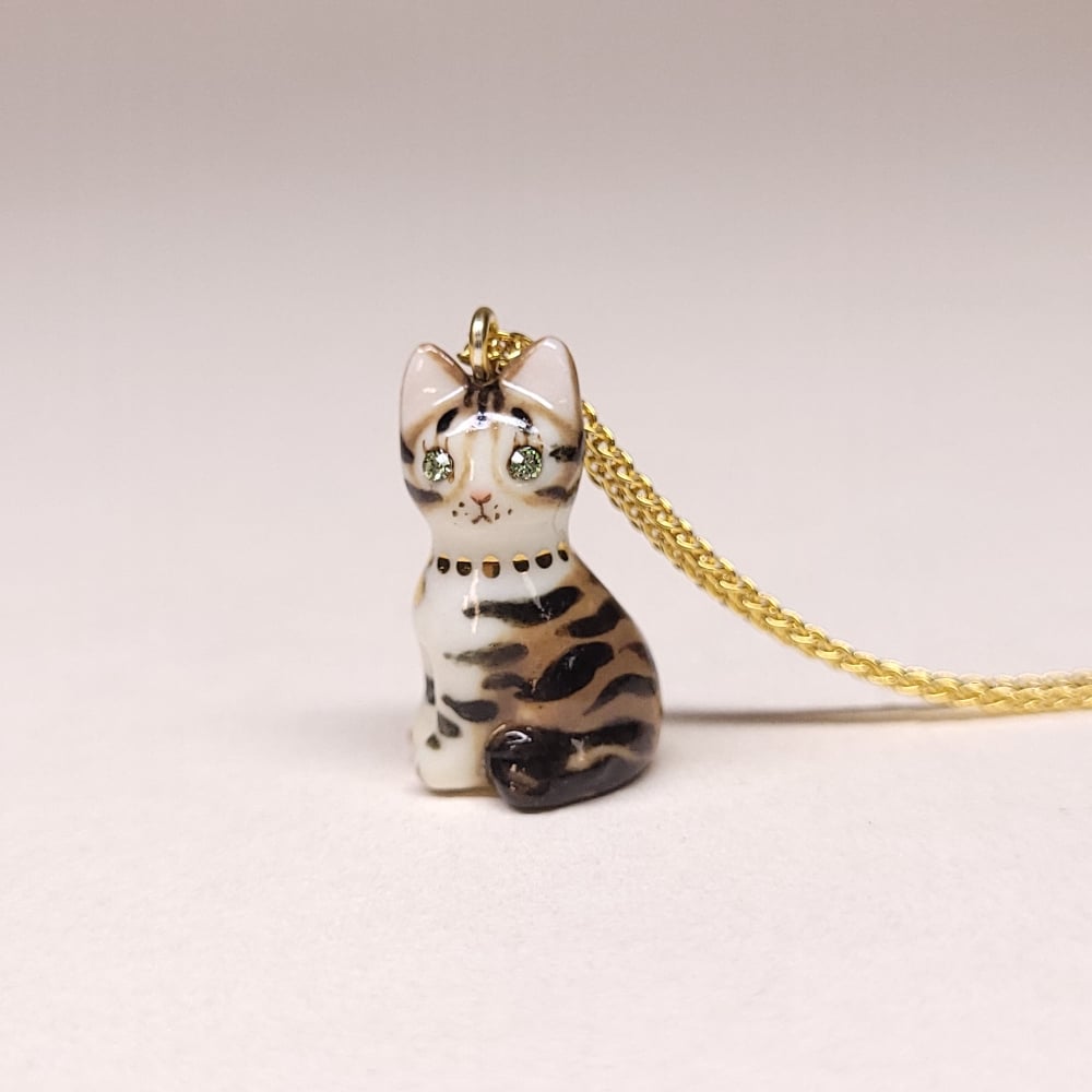 Image of Brown and White Tabby Porcelain & Gold Vermeil Sitting Kitten Pendant