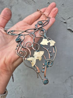 Golden fishes necklace 
