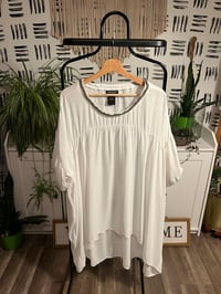 Image 1 of white sheer high /low puff sleeve beaded neck top