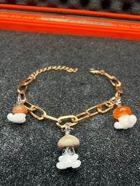 Image 1 of Orange Glass mushroom charm bracelet 