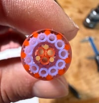Image 3 of Orange and milky blue stripes with a UV center 