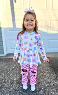 Image 1 of Hugs & Kisses Peplum (size 6,7,8)