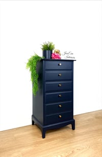 Image 2 of Stag Minstrel Tallboy / Chest Of Drawers painted in navy blue.