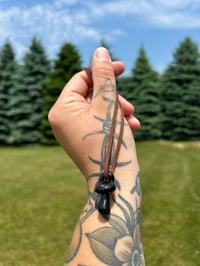 Image 1 of “black out days” mushroom pendant