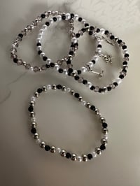 Image 5 of Black, White and Silver Tumbler Bracelet Stack