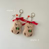 red bowed bear charm