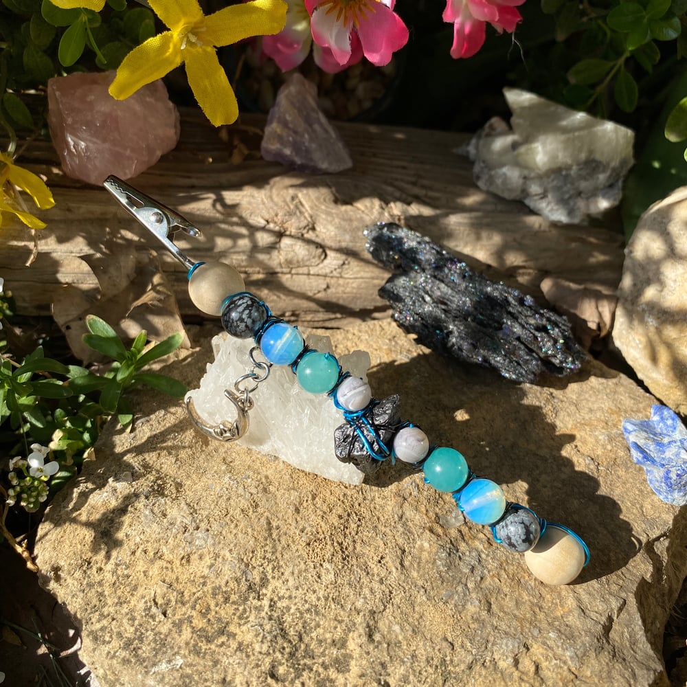 Image of black moon rocks roach clip