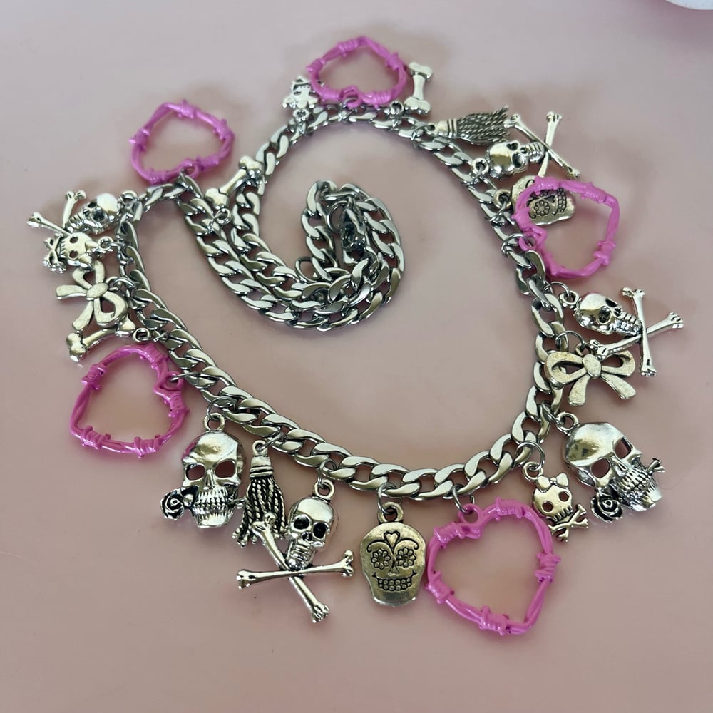 Image of One of a Kind Pink Barbed Heart, Skull, Bow necklace