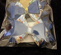 Image 1 of 4" Character Leather Bows