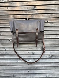 Image 8 of Leather messenger with folded top in oiled leather Musette Satchel with adjustable shoulderstrap