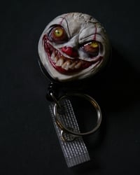 Image 14 of Handmade Pennywise Badge Reel Keychain 