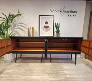 Image of Extra Long Nathan Sideboard in Black on tall wooden tapered legs