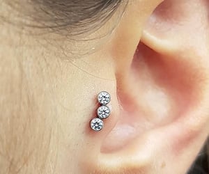 TRAGUS PIERCING SERVICES