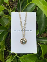 Image 3 of Small stg sil and 9ct gold aquamarine pendant