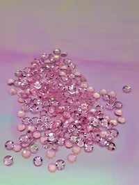 Image 1 of pink translucent nail stone