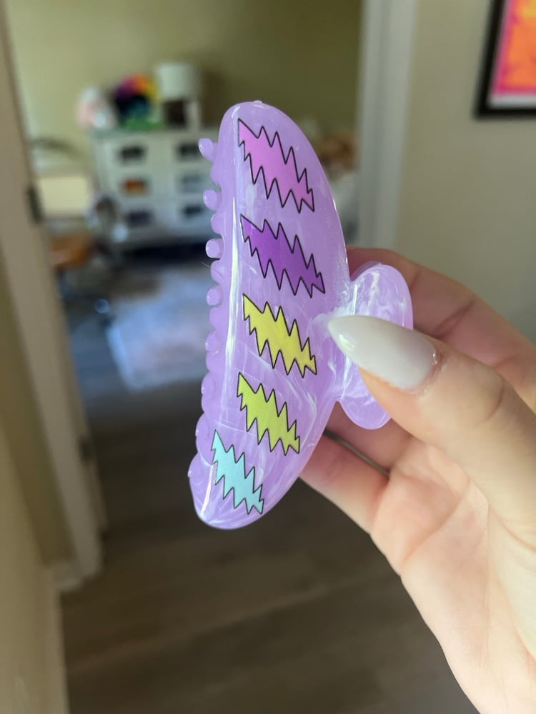 Image of dancing bolts hair clip